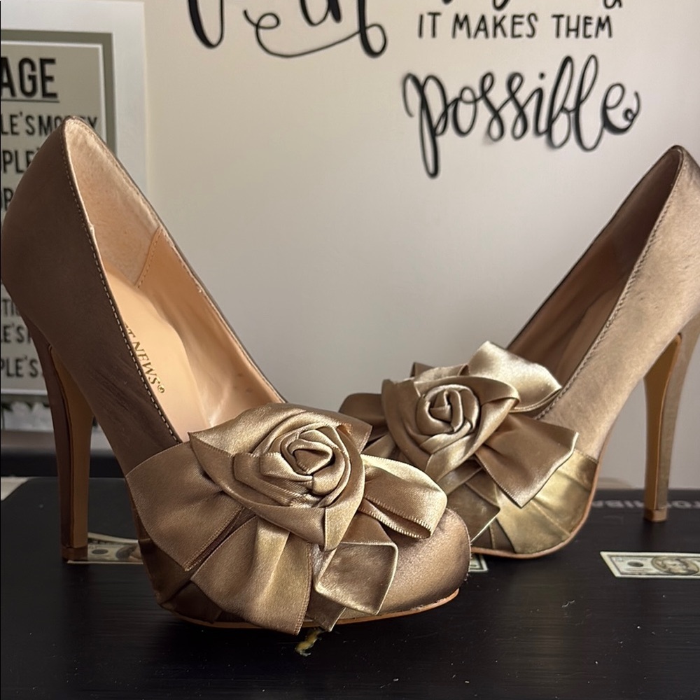 Newport News Gold Heels with Rosette Embellishments